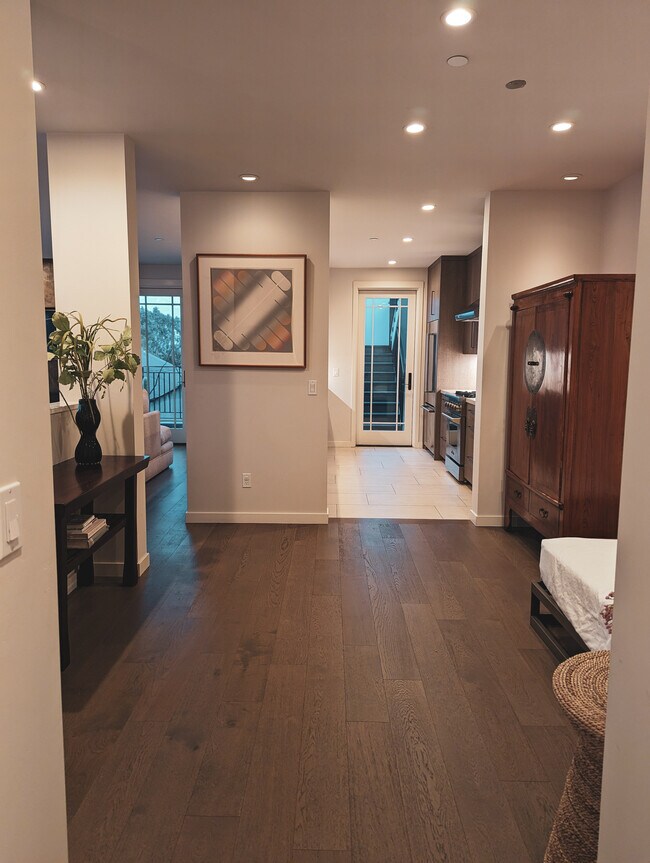 Kitchen down Entry Hall and Daybed - 223 Grand Ave Unit Grand Avenue Luxury Condo