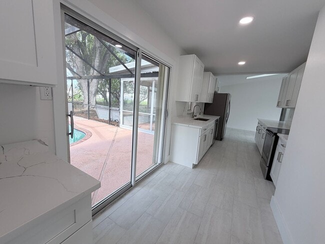Photo - SECTION 8!!! 3/2 pool home with 2 BONUS ROOMS AVAILABLE 09/01/2026