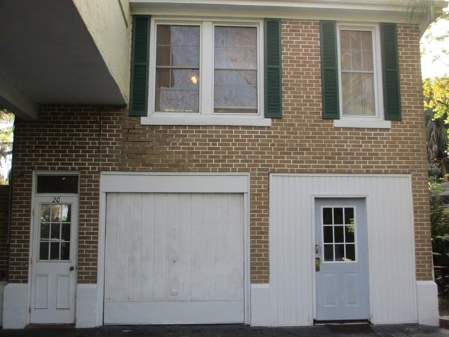 carriage house - The Wellington Apartments