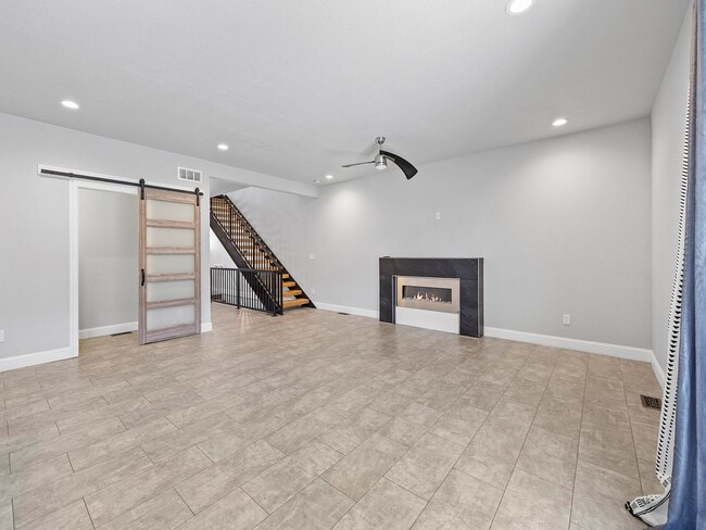 Photo - 4-Bedroom Townhome with Finished Basement, Garage & Private Outdoor Space
