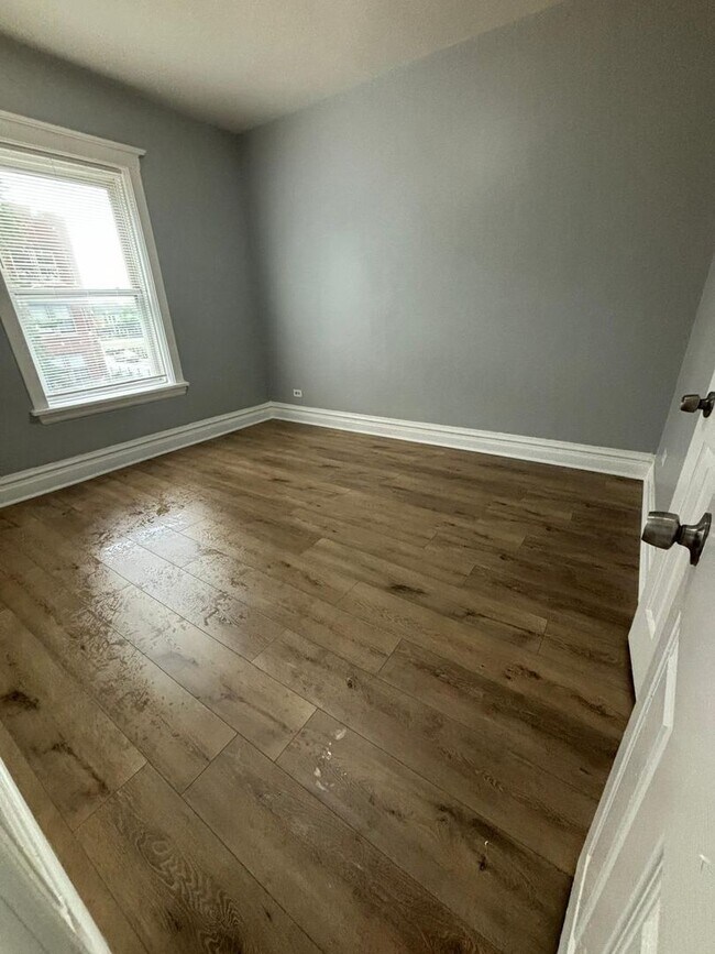 Photo - 1446 E 69th Pl Casa