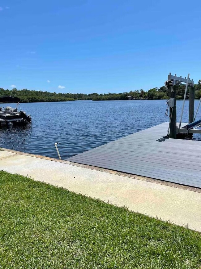 Photo - 4 Bed/2 Bath Waterfront Paradise with Pool, Dock & Gulf Access in Baileys Bluff
