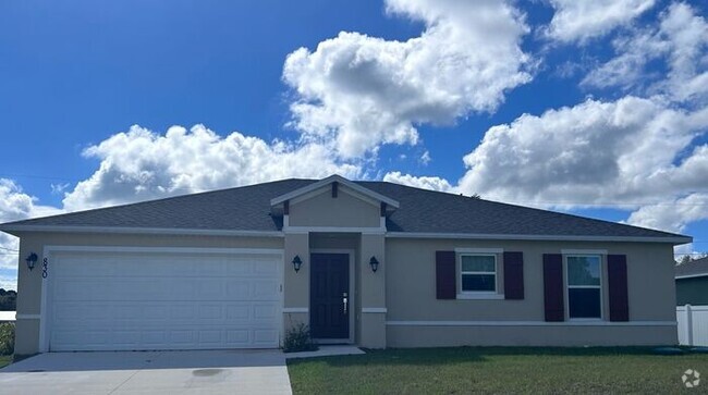 Building Photo - *** BEAUTIFUL 4/2 HOME IN PALM BAY$1000 of...