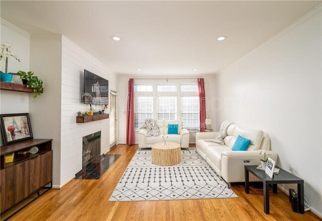 Building Photo - 220 Renaissance Pkwy NE Unit 1207