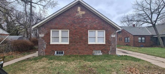 Building Photo - 1105 W 14th St N Unit 1