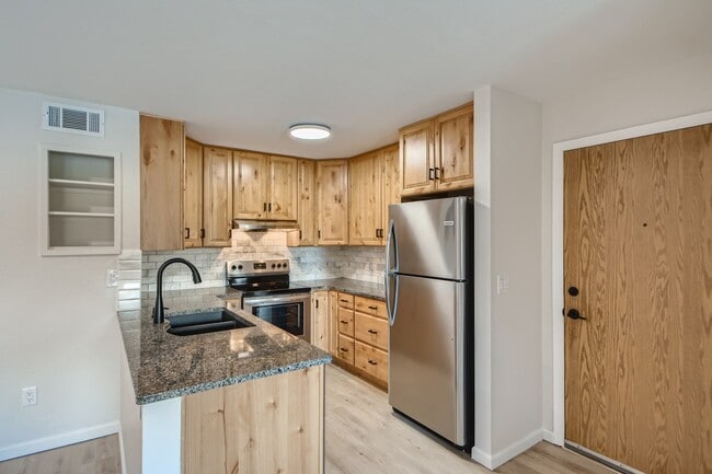 Tons of cabinet space, granite countertops & brand new stainless steel appliances - 697 Canyon Dr Unit Canyon Drive Condos