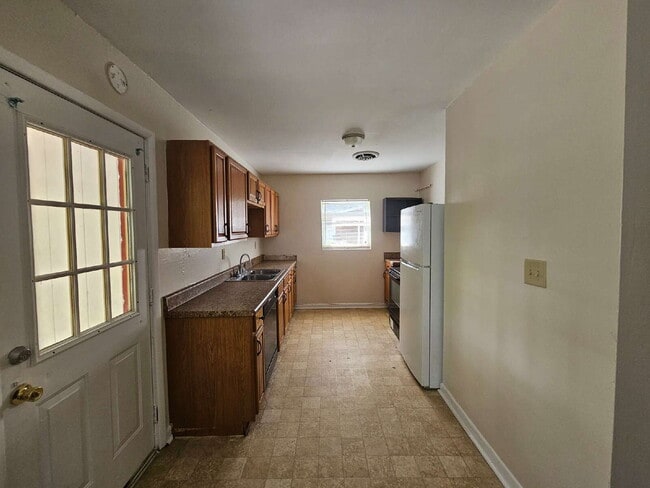 Photo - "Charming 4-Bed Home with Spacious Layout