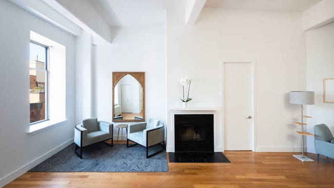 Photo of 95 Horatio St Model Apartment 702 With Staged Living Room and City View - The West Coast
