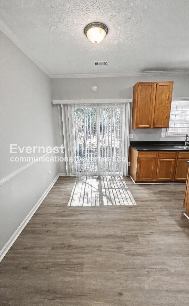 Photo - 4 Bed, 2 Bath Home with Garage / Pet-Friendly / Available Now!