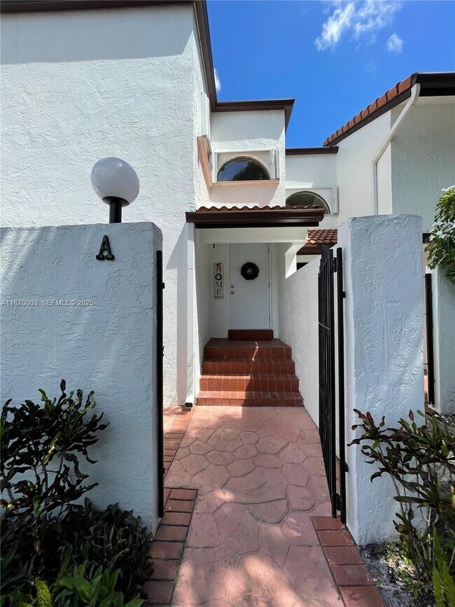 Building Photo - 1301 SW 124th Ct Unit 20-A