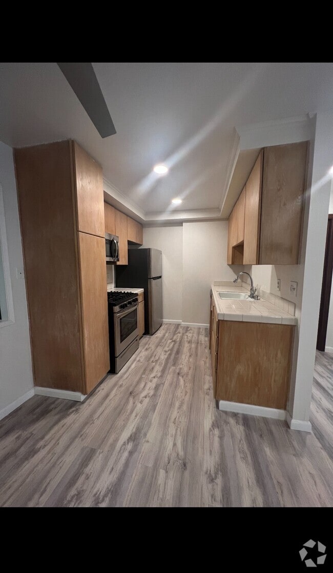Building Photo - 6600 Warner Ave Rental