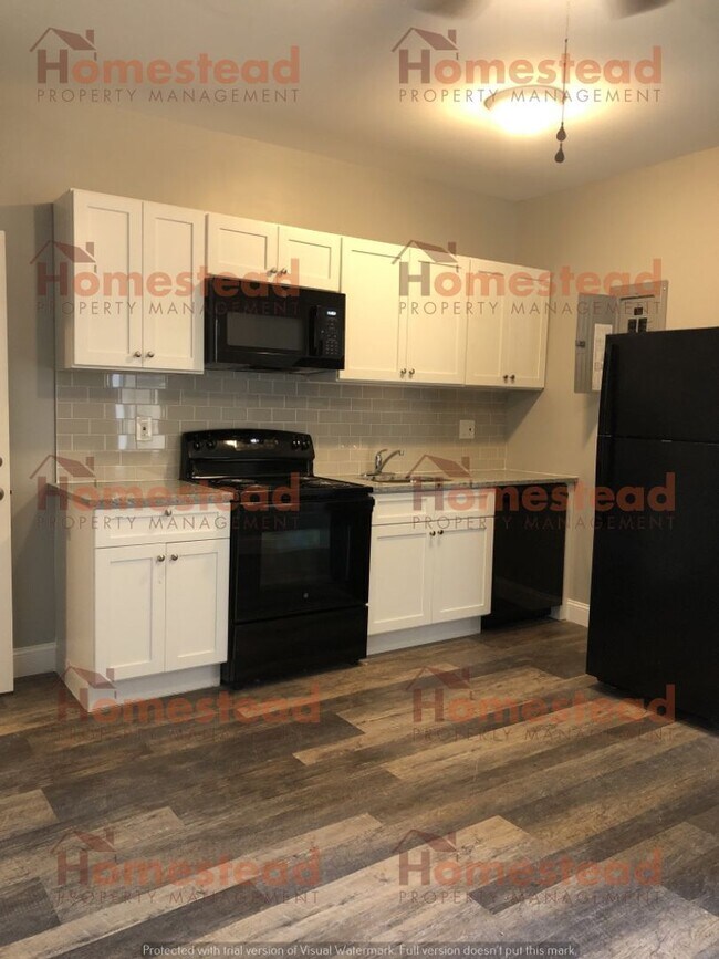 Building Photo - 6139 Vine St Unit Apt 2