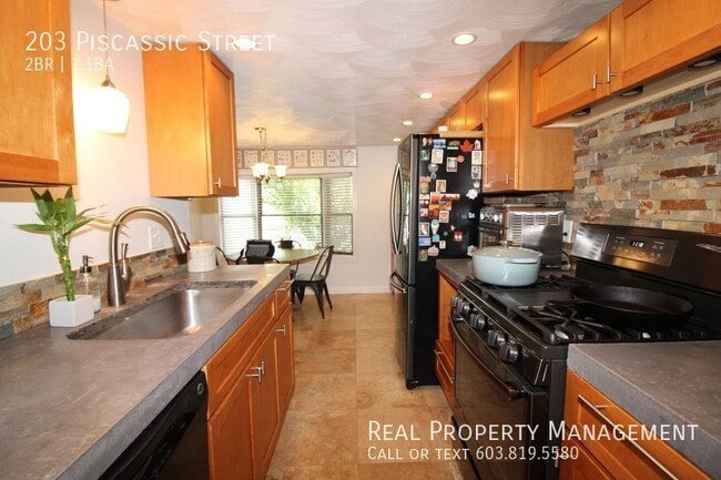 Photo - 203 Piscassic St