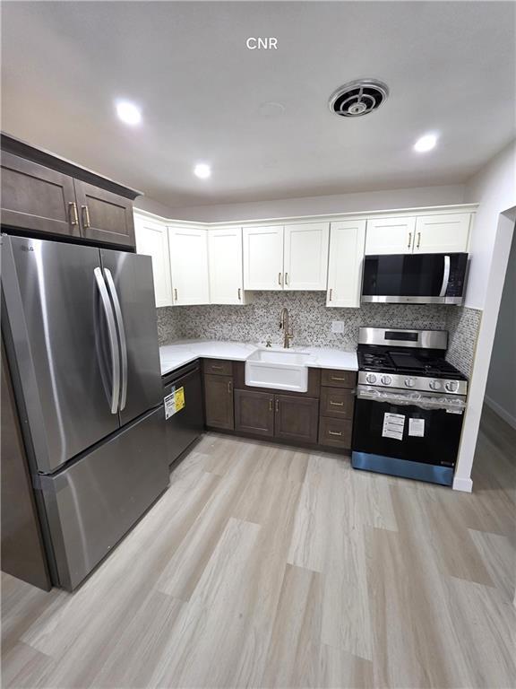 Building Photo - 10530 Flatlands Ave Unit 1