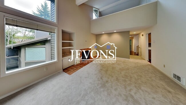 Building Photo - Top-floor 2-level condo with brand-new kitchen and ensuite bath – Utilities and internet included...