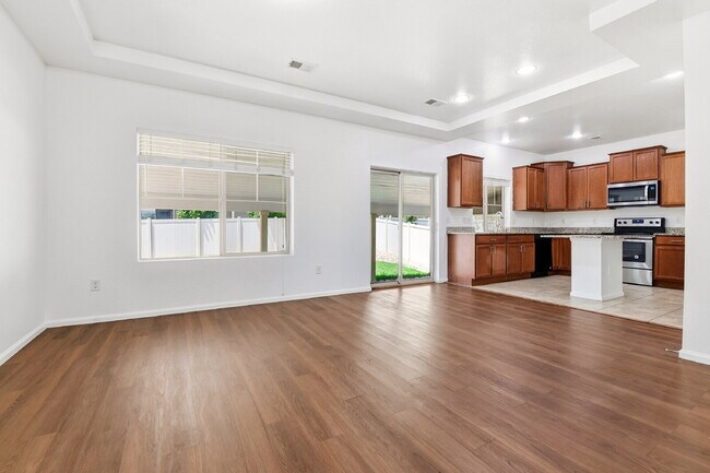 Photo - $2,940.95 - 4 Bed, 3 Bath Home in Denver with Central A/C and Fenced in Yard!