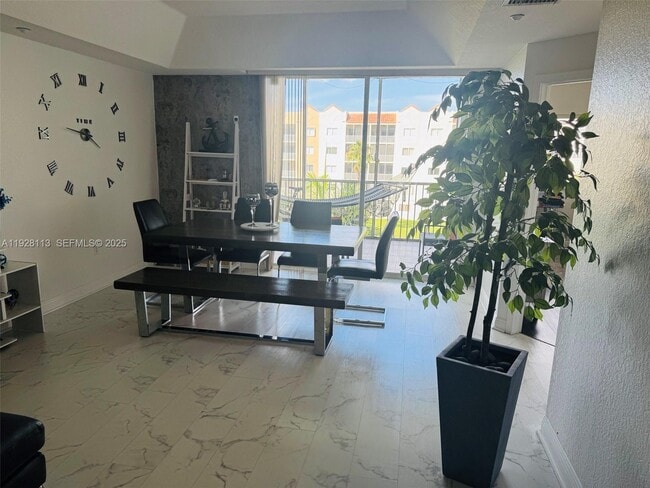 Building Photo - 10700 NW 66th St Unit 414