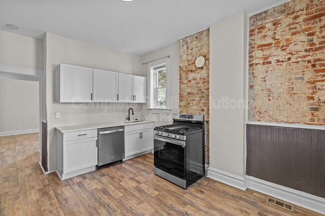 Building Photo - 3402 Dunnica Ave Unit 3400 1f