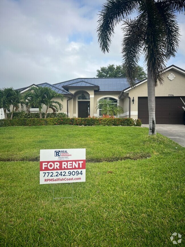 Building Photo - Convenient 3/2/2 PSL Home with Backyard Oa...