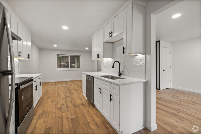 Spacious kitchen opening into living room - Rosedale Townhomes