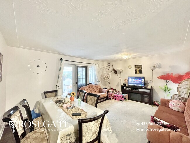 Photo - Charming 3-Bedroom Home with Backyard & Pa... Unit 1