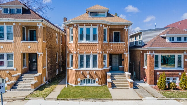 Building Photo - 6954 S Maplewood Ave Unit 1R Rental