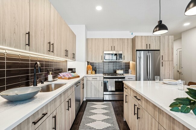 Culinary cool — a sleek kitchen where design meets daily function with effortless style. - 333 Water