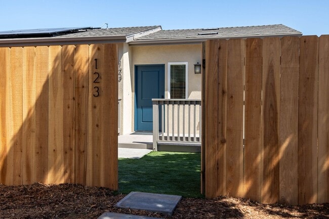 Photo - 4bd/2ba home with AC, off street parking and private yard!