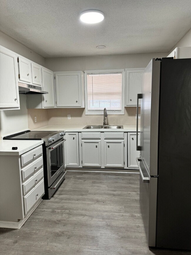 Photo - "Charming Lubbock Home: 3-Bedroom, 2-Bath Sanctuary with 1157 Sq Ft of Comfort!"