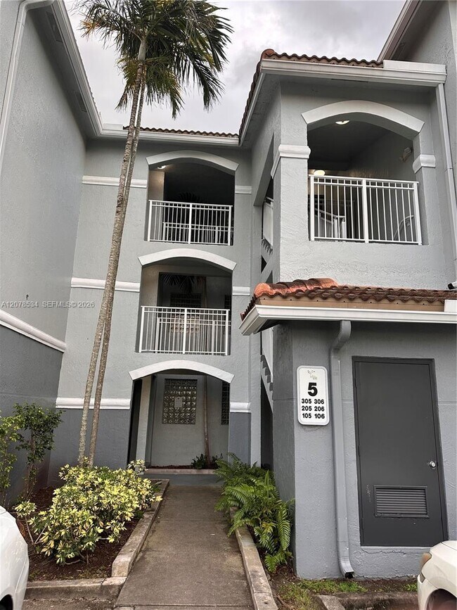 Building Photo - 9640 NW 2nd St Unit 5-306