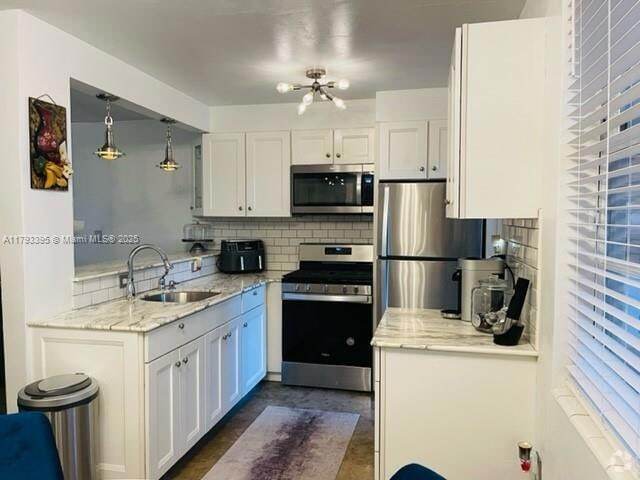 Building Photo - 1698 Jefferson Ave Unit 9 Rental