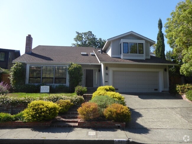 Building Photo - SPACIOUS FOUR BEDROOM / THREE AND HALF BAT... Rental