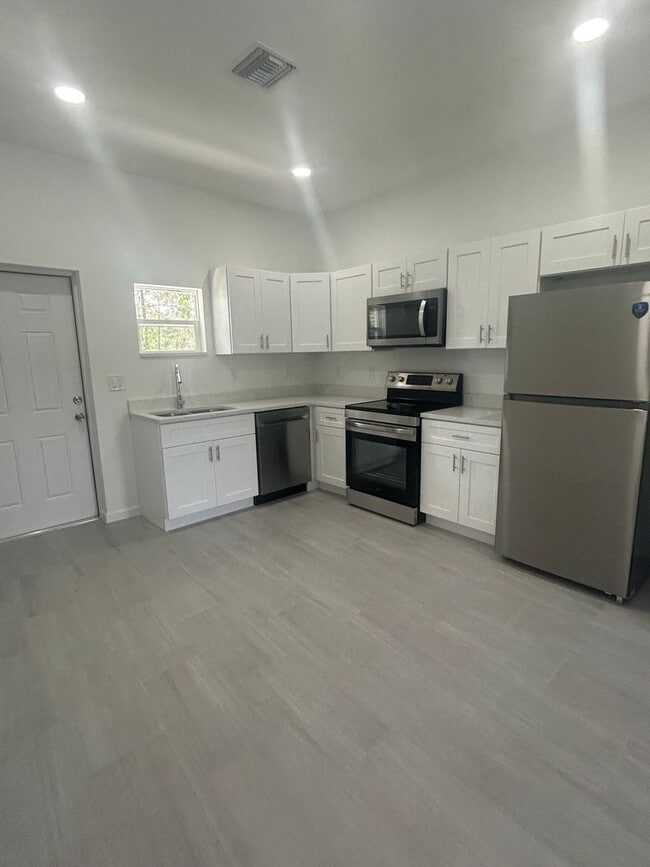 Photo - Brand-New Modern 2BR/2BA Home with Garage – Desirable Lake Placid Location