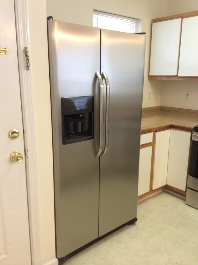 Photo - Updated flooring, McClelland Town homes 2BR/2Bath one level patio home, with back court yard! Clo...