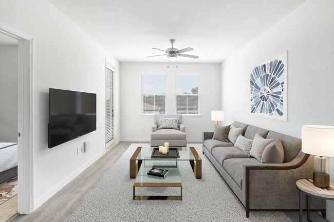 Experimente la serenidad en esta sala de estar bellamente diseñada, perfecta para la relajación y el estilo. - Cortona South Tampa