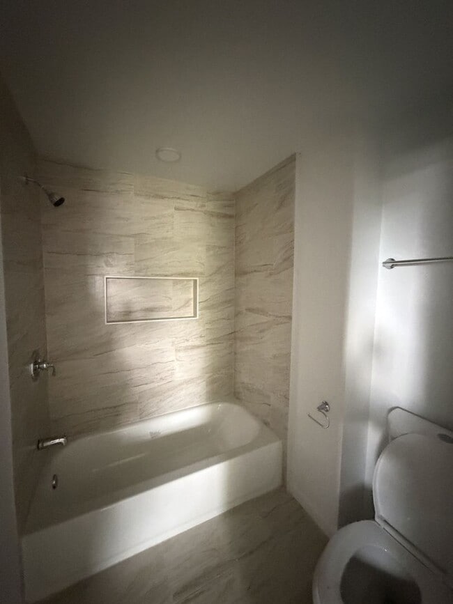 Photo - Spacious 4-Bedroom, 2-Bath House – Unfurnished