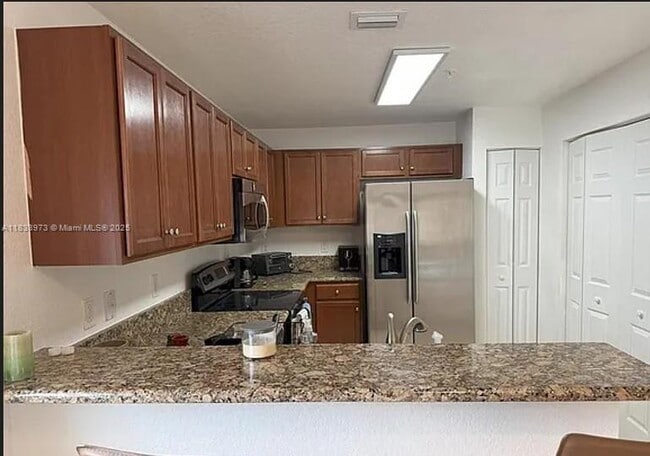 Photo - 11603 NW 89th St Unit 214
