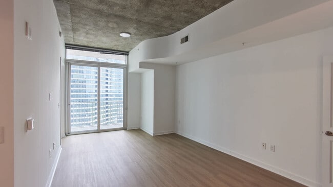 Living Room with Hard Surface Flooring - Skyhouse South