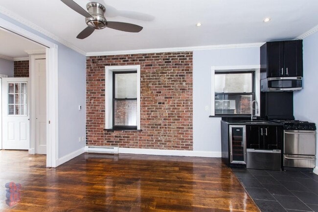 Photo - 434 W 52nd St Apartment Unit 14