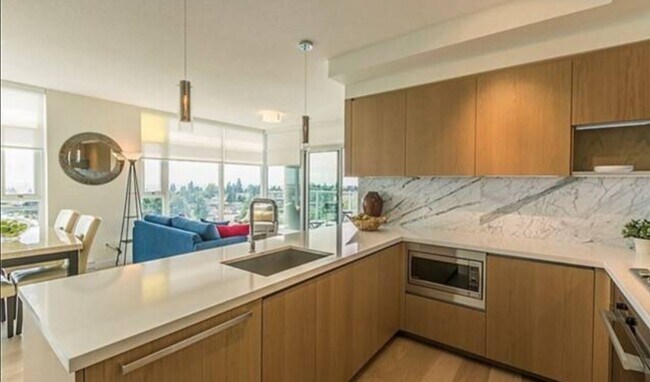 Building Photo - 6588 Nelson Av Unit 1005