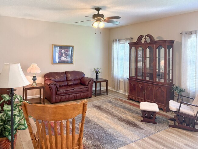 Photo - Fully Furnished 4-Bedroom Home with a Stocked Kitchen, Fenced Yard, and 2-Car Garage