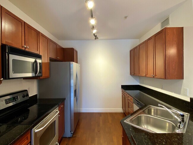 Photo - Stylish 1BD/1BA Condo with Garage & Balcony in Sought-After Englewood Location | $1,795/mo