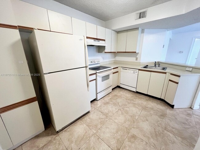 Building Photo - 8977 Wiles Rd Unit 205 Rental