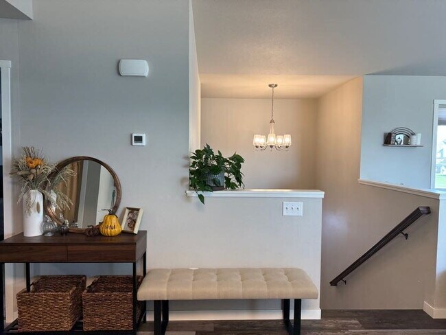 Photo - Spacious 4-Bed, 2-Bath Split-Level Townhome with Attached Heated Garage