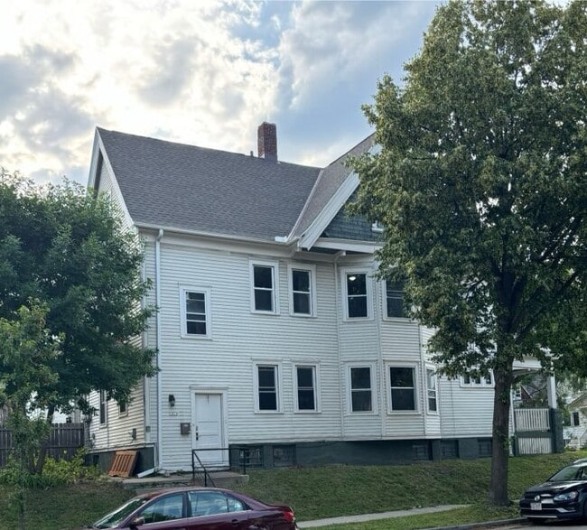 shared entrance on side of home - key pad lock - grass back yard - 633 E Burleigh St Unit 2