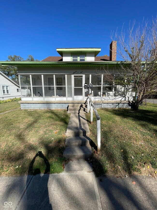 Building Photo - 1604 W 15th St Unit A