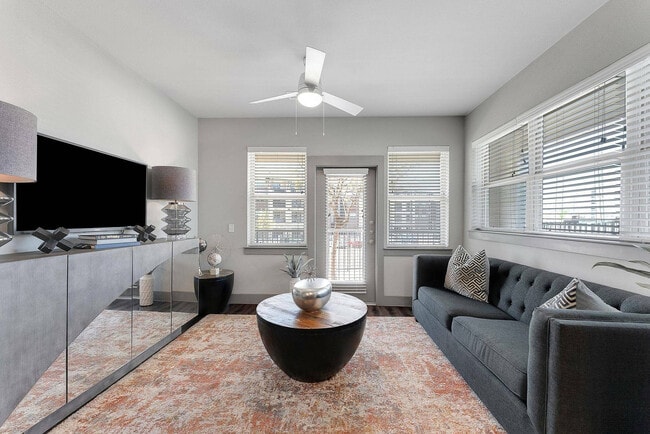 Spacious living area filled with natural light - Discovery Park