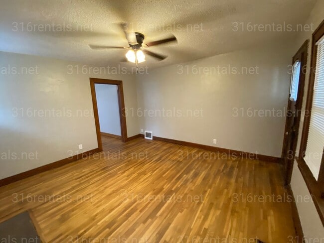 Photo - $925 - 2 bed 1 bath - Home with a fenced yard and garage