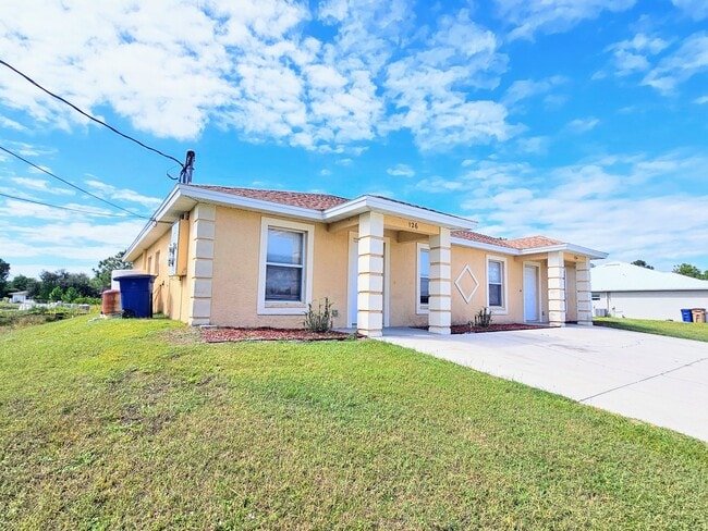 Building Photo - Nice 3 Bedroom Duplex in Lehigh Acres