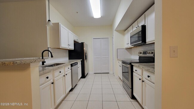 Photo - 6984 Ortega Woods Dr Unit 8-4